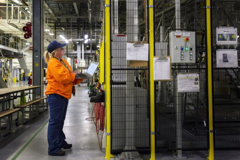 Woman checking systems
