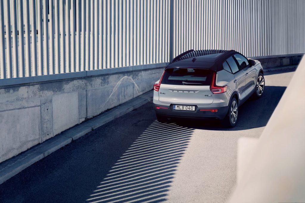 Volvo SUV driving up ramp