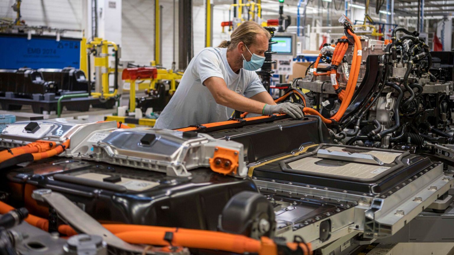 A Volvo employee works in the automaker’s battery assembly plant in Belgium.
