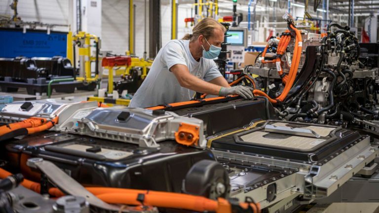 A Volvo employee works in the automaker’s battery assembly plant in Belgium.