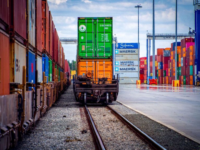 Cargo containers are loaded on and off Norfolk Southern trains