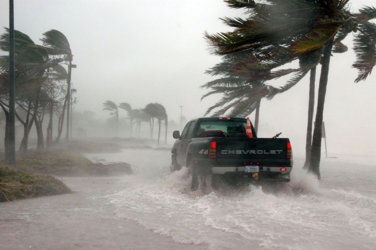 Image of truck in a heavy storm